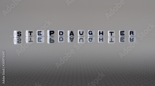 Fotografie The concept of stepdaughter represented by wooden letter tiles