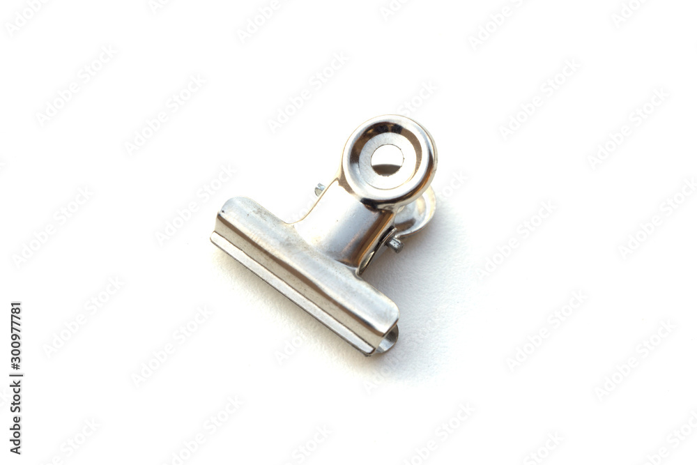 Silver chromium paper binder or clipper used for organizing documents
