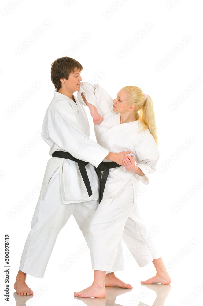 Cute blonde girl and a young cheeky guy karate Cute blonde girl and a young cheeky guy karate