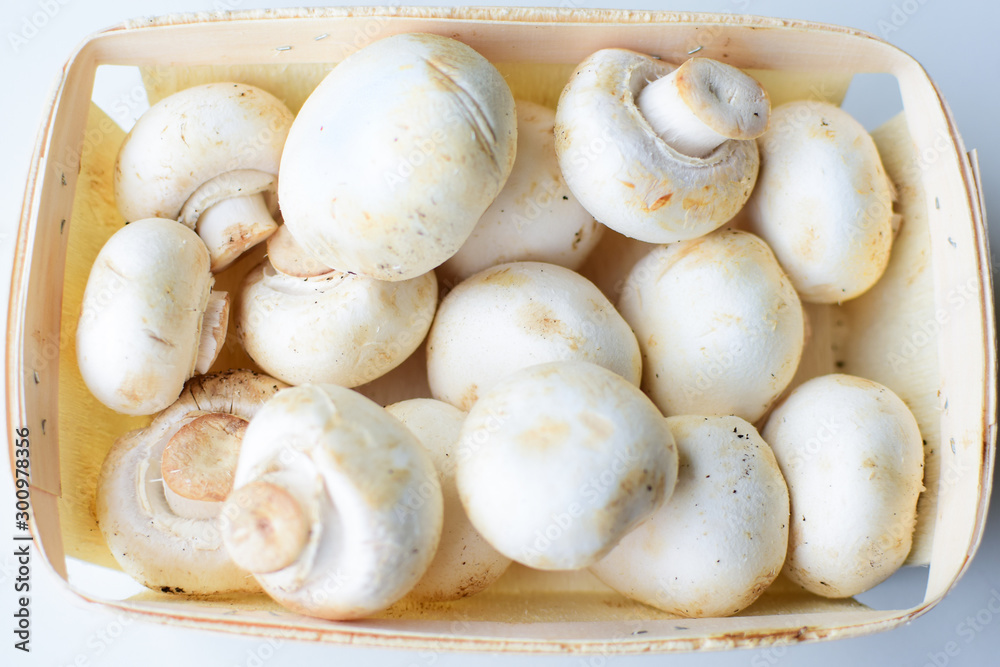 Champignons are in the basket. View from above Champignons are in the basket. View from above