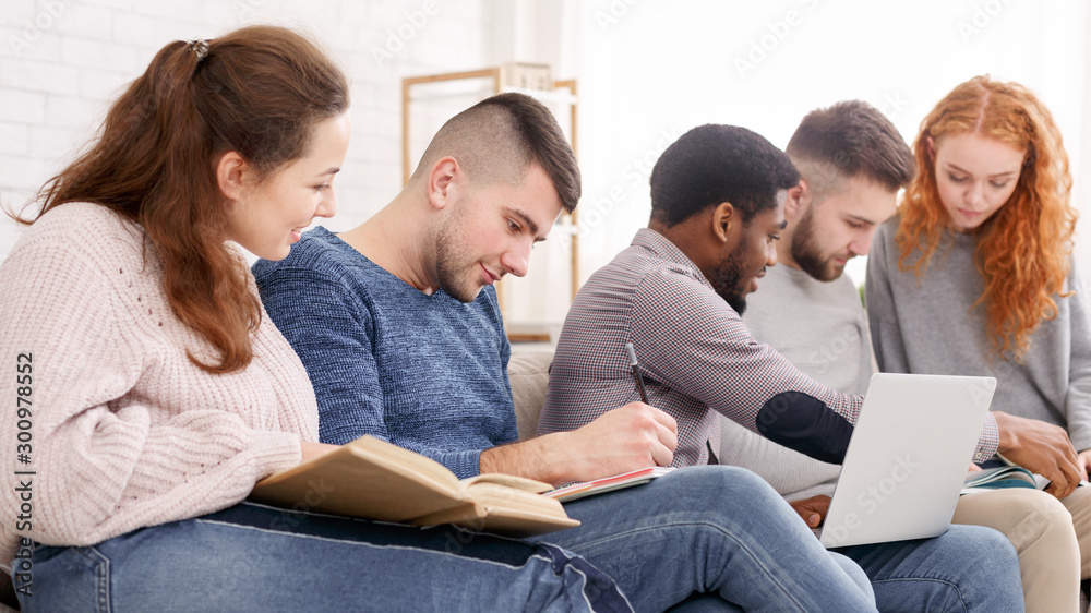 Group of diverse students preparing for classes Group of diverse students preparing for classes