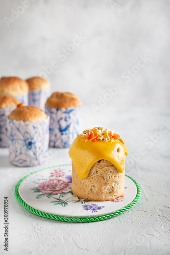 Homemade Easter cakes in paper wrapper. Light background