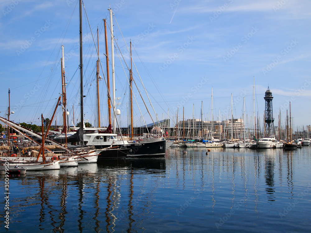 Yacht Parking in the port of Barcelona, in the background of the port management building.