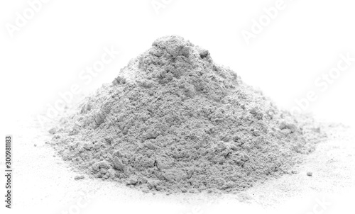 Pile of cement powder isolated on white background photo