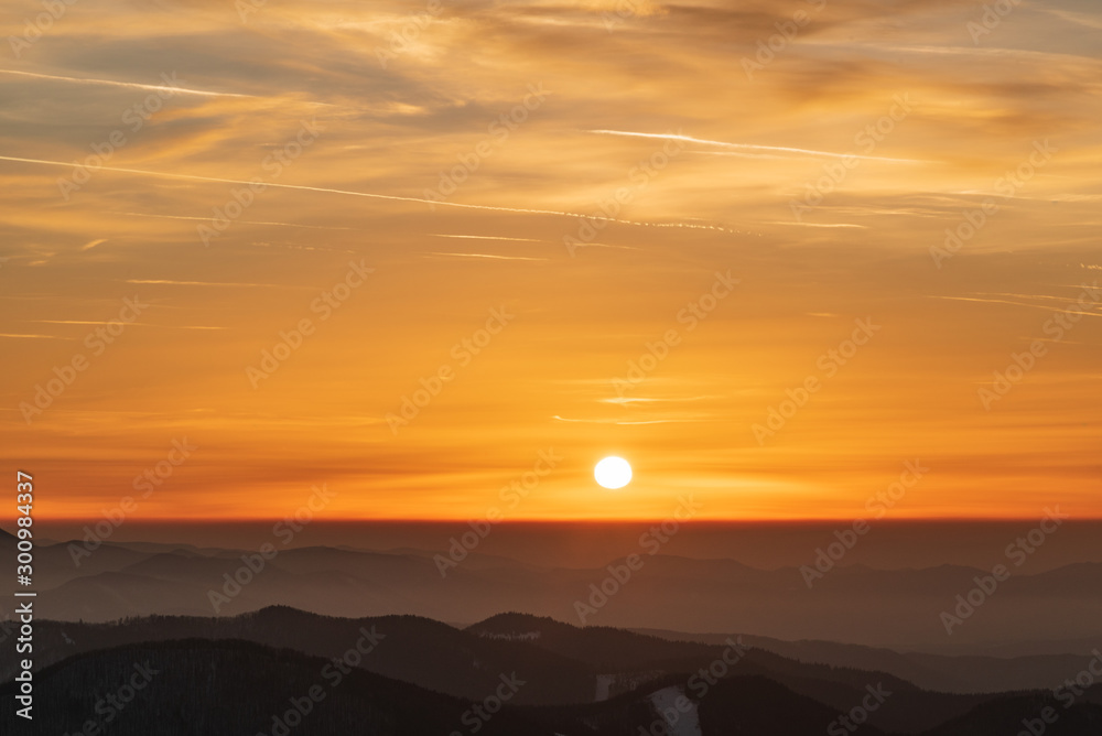 sunset with colorful sky from Veterne hill in winter Mala Fatra mountains in Slovakia