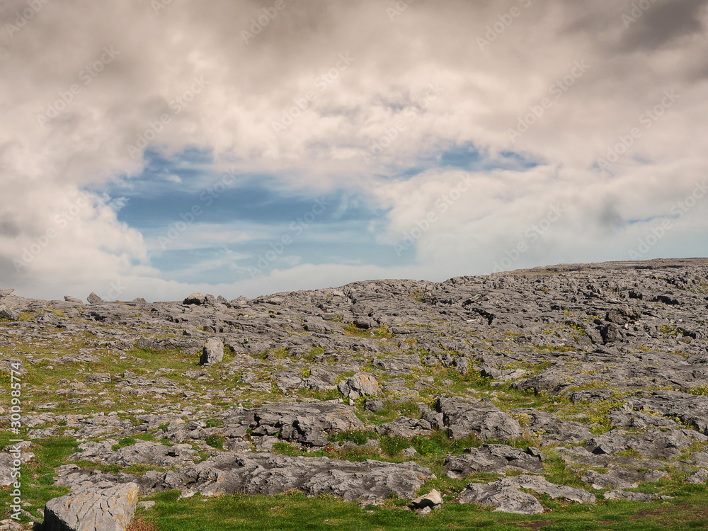 Burren national park, county Clare, Ireland, Rock terrain and formation, Blue cloudy sky, nobody,