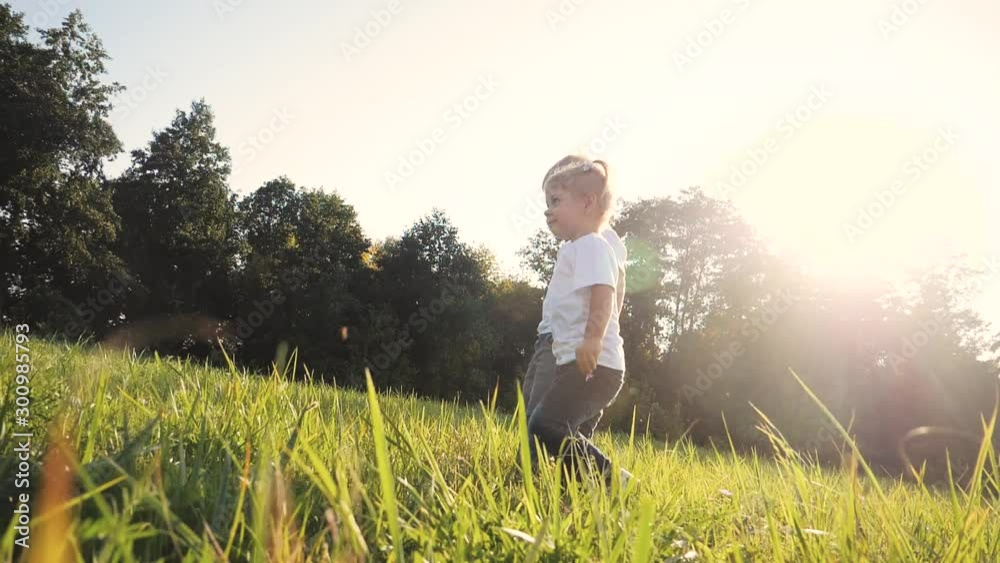 Happy family walking: funny slow motion video little kid boy hold hands go nature play whirl a and girl brother and sister lifestyle hold hand on nature happy children concept. children happy family Happy family walking: funny slow motion video little kid boy hold hands go nature play whirl a and girl brother and sister lifestyle hold hand on nature happy children concept. children happy family