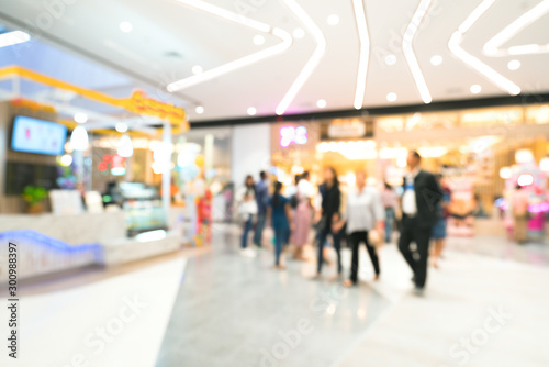 Blurred image of people shopping in department store