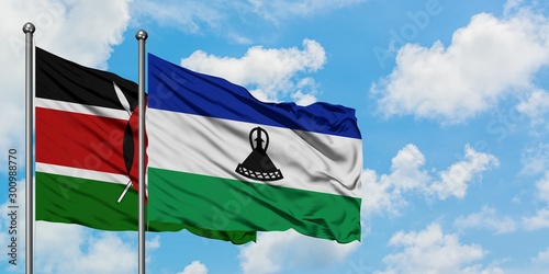 Kenya and Lesotho flag waving in the wind against white cloudy blue sky together. Diplomacy concept, international relations.