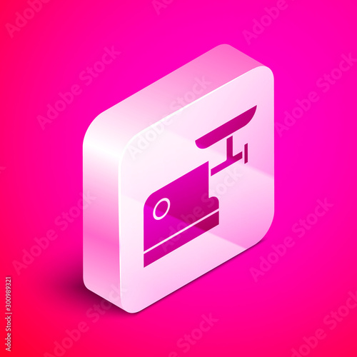 Isometric Kitchen meat grinder icon isolated on pink background. Silver square button. Vector Illustration