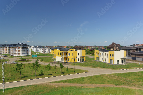 Bright low-rise apartment buildings in the new district of Krasnodar on the streets of Schumann and Wagner on a Sunny day