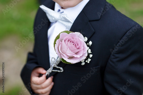 Groom with flower boutonniere on wedding day