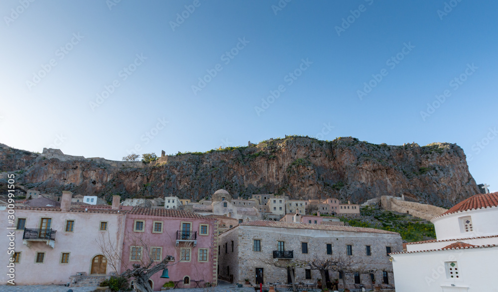 Romantic fortified greek village on rock island Monemvasia at sunset