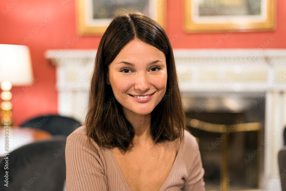 portrait of a young attractive woman in a elegant hotel cafeteria portrait of a young attractive woman in a elegant hotel cafeteria