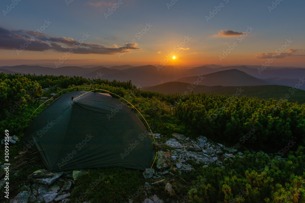 Beautiful summer in the Carpathian Mountains with tourists in tents with beautiful views ..