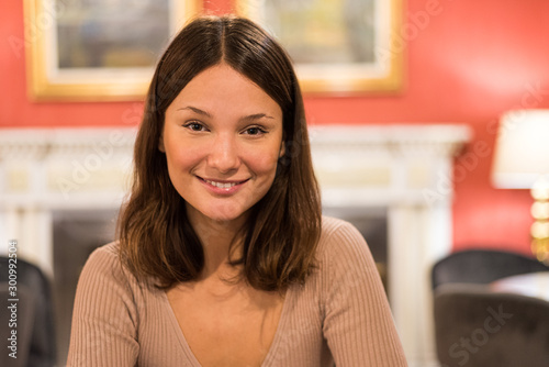 portrait of a young attractive woman in a elegant hotel cafeteria Free Download portrait of a young attractive woman in a elegant hotel cafeteria - GFXLoad
