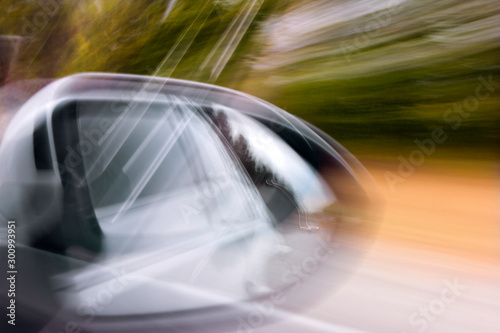 car rearview mirror when driving fast © Zadiraka
