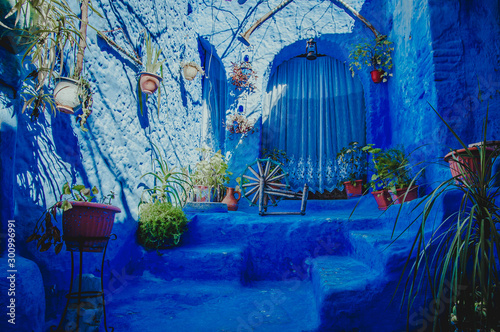 Typical moroccan building with living space in Chefchaouen blue city medina in Morocco with blue walls, doors, windows
