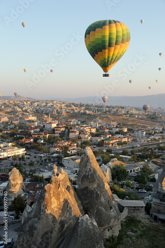 Göreme, Turkey - 09/18/2009: View from the observation deck of the village of Göreme on the flight of balloons over the valleys of Cappadocia.
