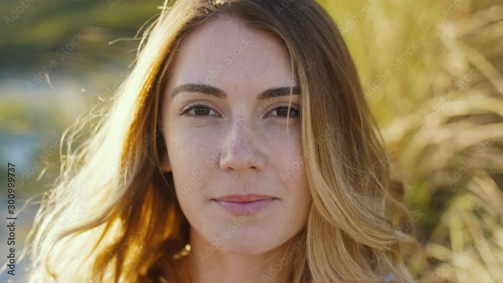 Portrait of a natural attractive woman at sunset, confident healthy wellness living Portrait of a natural attractive woman at sunset, confident healthy wellness living