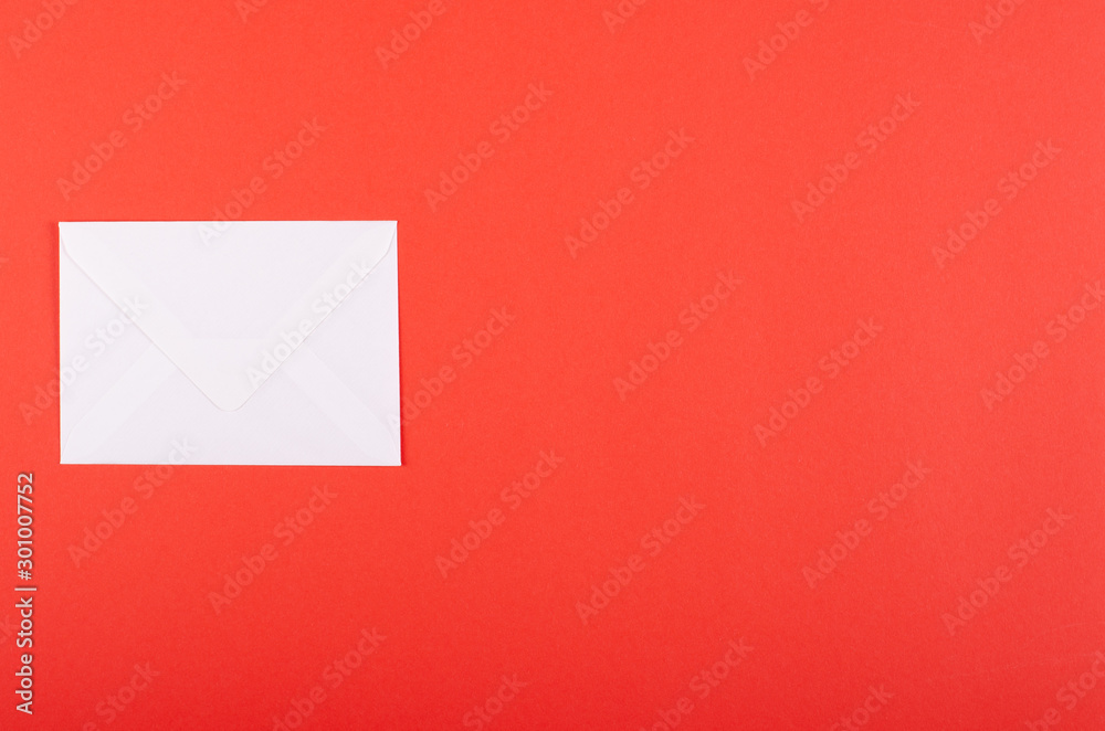 Paper envelope composition on red background. Flat lay. Paper envelope composition on red background. Flat lay.