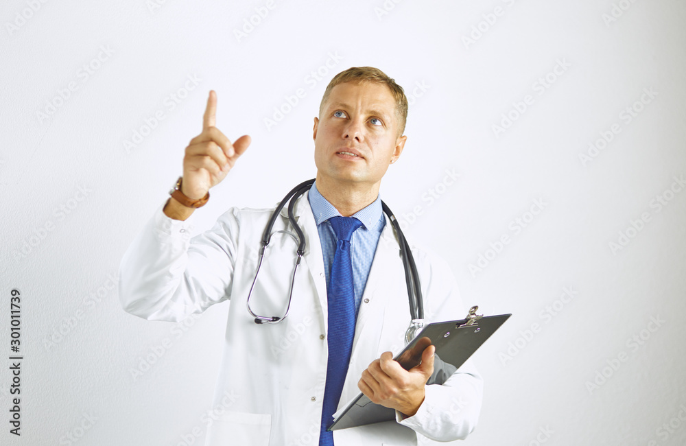 Young confident doctor in a white coat with a stethoscope Young confident doctor in a white coat with a stethoscope