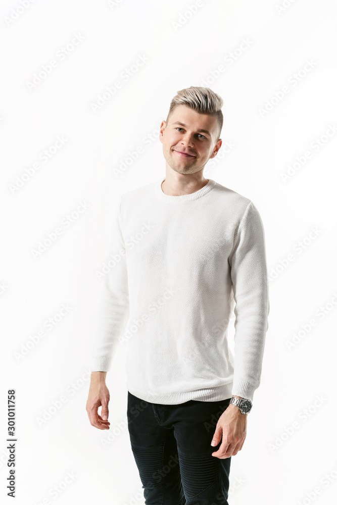Portrait of handsome male student man looking at camera over white background and showing emotions Portrait of handsome male student man looking at camera over white background and showing emotions