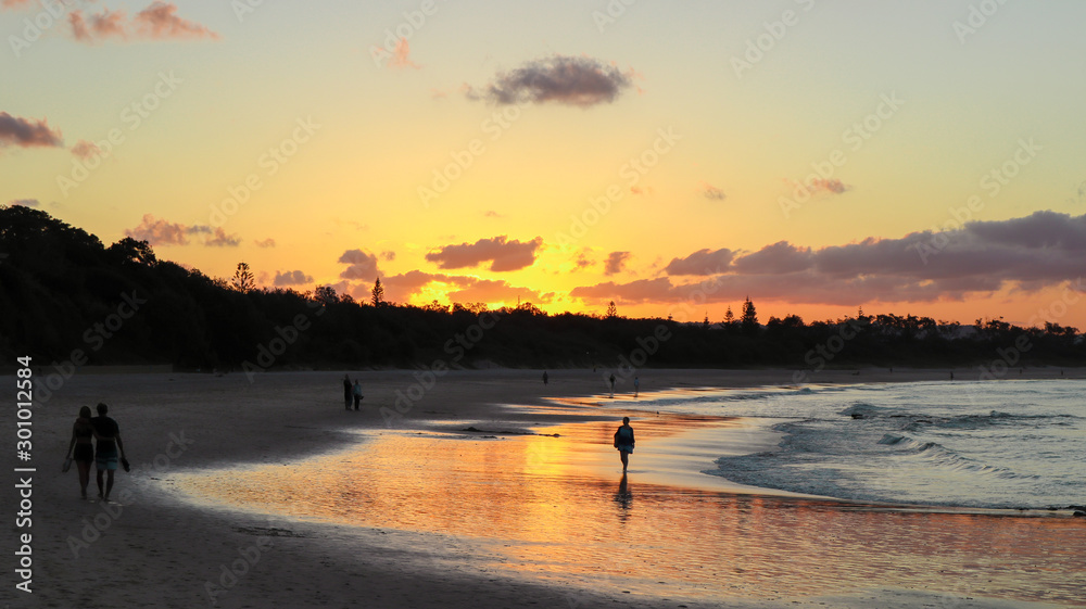 Reflection of Byron Bay beach at sunset time