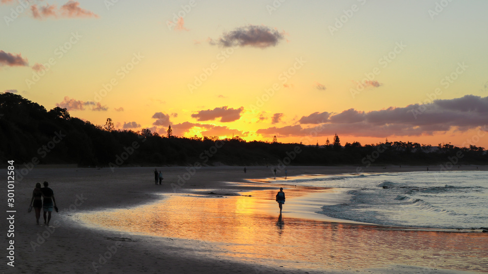 Reflection of Byron Bay beach at sunset time Reflection of Byron Bay beach at sunset time