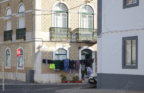 NB__7744 Clothes drying on ropes on the road photo