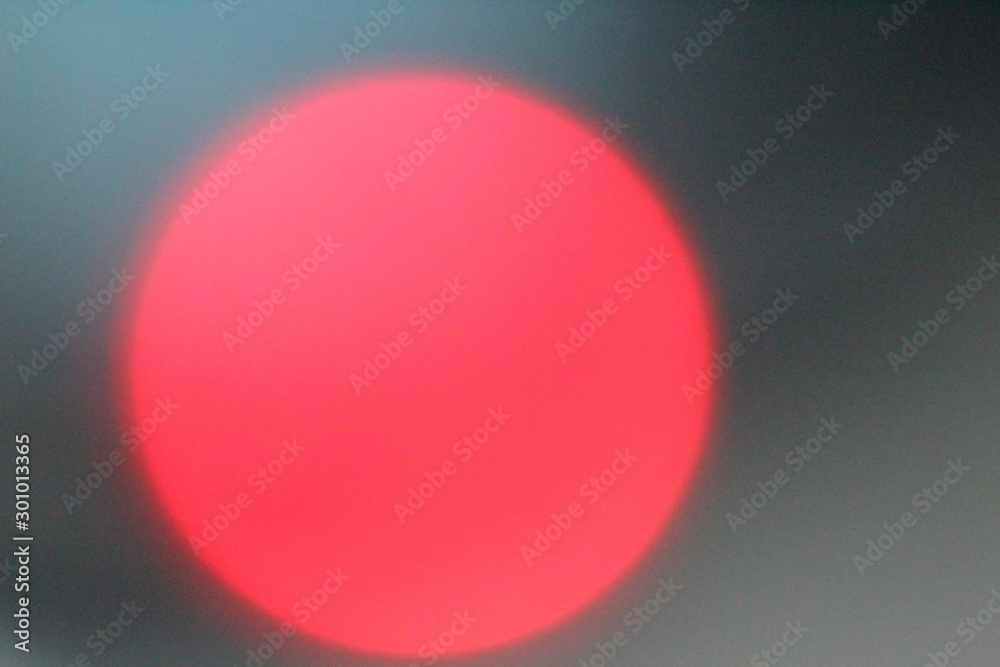 Defocused lights, red lens flare. Abstract blured background Defocused lights, red lens flare. Abstract blured background