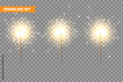 Realistic Christmas sparkler collection on transparent background. Bengal fire effect. Festive bright fireworks with sparks. New Year decoration. Burning sparkling candle. Vector illustration.