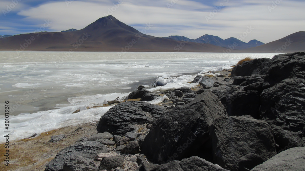 Laguna Blanca, and in the background the Licancabur volcano on the Bolivian highlands in Potosi