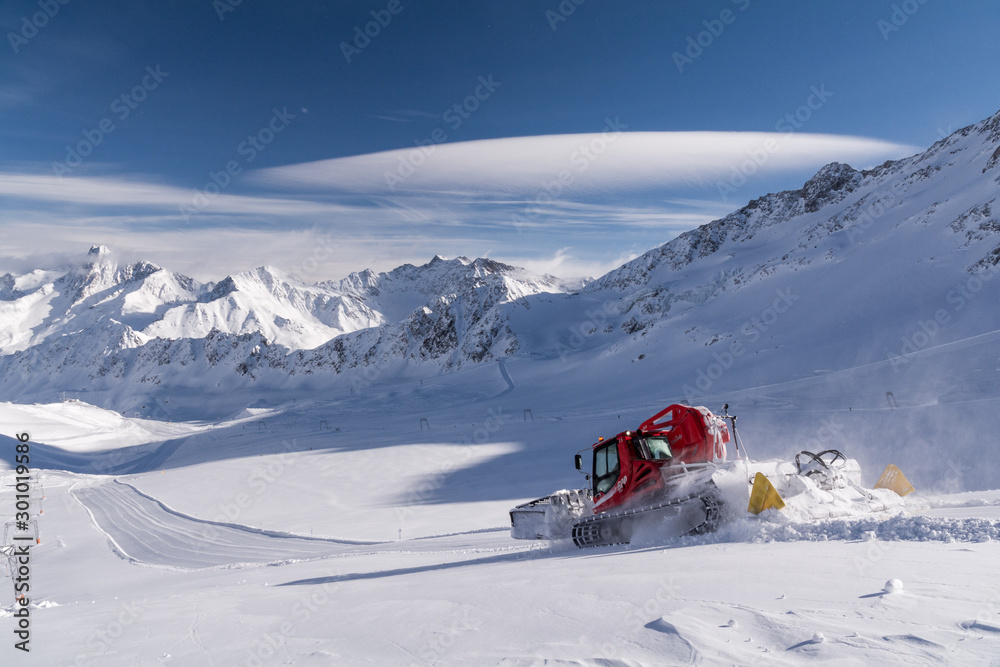 Ski slope preparation in the mountains. Perfect ski slopes. Kaunertal ski resort in Tyrol, Austria, the Alps. Kaunretal glacier.