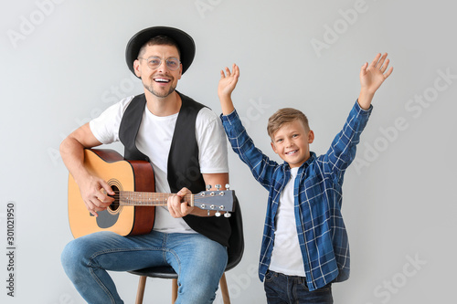 Handsome man and his little...
