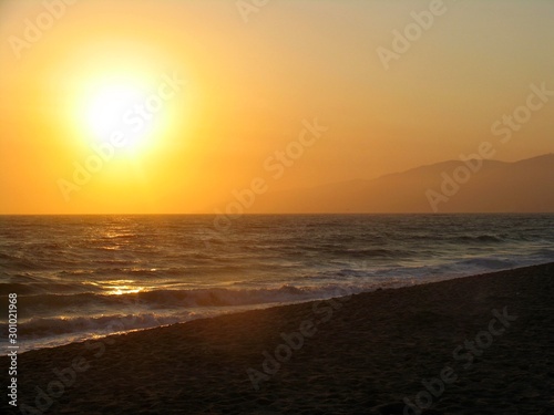 sunset on the beach in malibu california