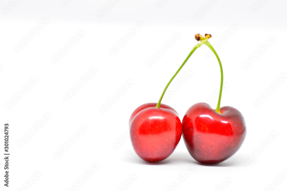 red cherries on white background red cherries on white background