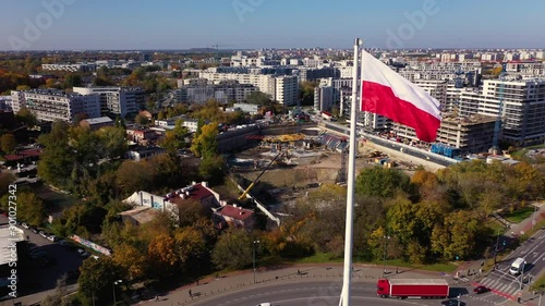 Drone footage of the Polish flag in the center point of roundabout.