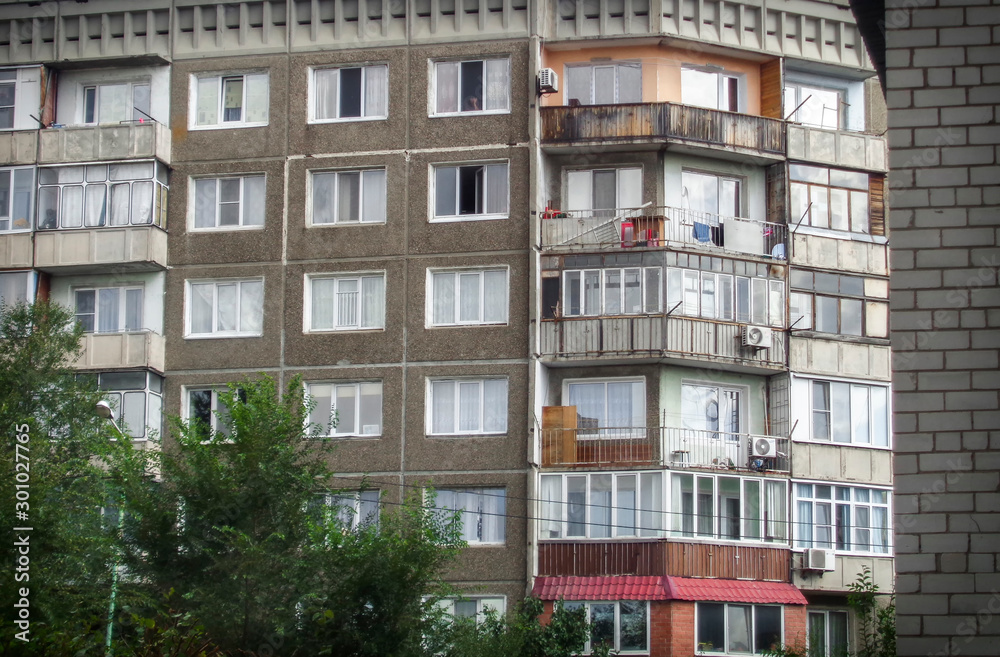 Soviet architecture. Apartment building. Soviet architectural style. Typical socialist apartment building. Apartment block. Architectural background. Ust-Kamenogorsk (Kazakhstan)