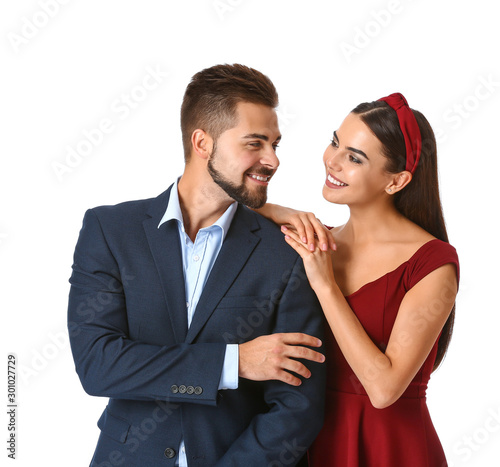 Portrait of beautiful young couple on white background