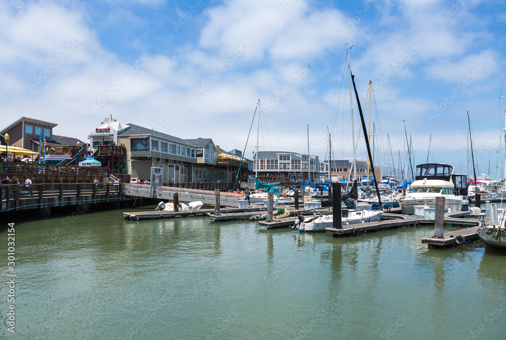 SAN FRANCISCO, USA - JUNE 14: Pier 39 at San Francisco Bay, on JUNE 14, 2015. Pier 39 was first developed by entrepreneur Warren Simmons and opened October 4, 1978