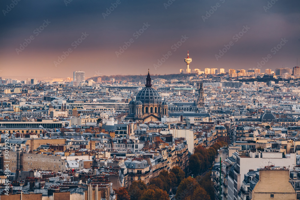 Panoramic view from the Arc de Triomphe, The Basilica of Sacred Heart at Montmartre. France. Famous touristic places in Europe. European city travel concept.