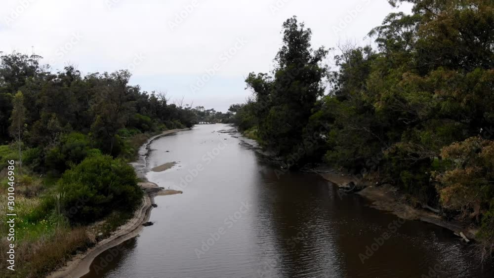aerial video touring the river with forestation to its surroundings. La Floresta Uruguay aerial video touring the river with forestation to its surroundings. La Floresta Uruguay