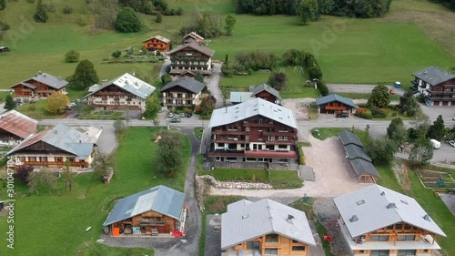 Backwards drone video of the French alps in la Chapelle d'abondance photo