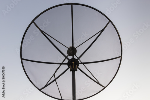 Silhouette of a small Satellite dish Communicator technology network.idebar with collapsible lists is being considered for merging. › A satellite dish is a dish-shaped type of parabolic antenna design
