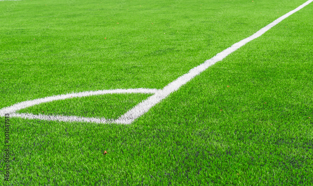 White line of  Artificial grass soccer field,corner soccer field.It made to look like natural grass. It is most often used in arenas for sports that were originally or are normally played on grass.