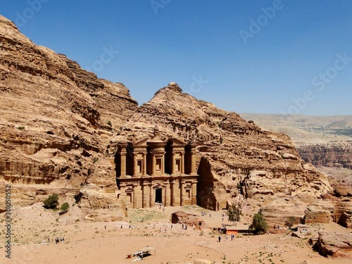 Panoramic view of remained Monastery in Petra in Jordan, an UNESCO World Heritage Site. Petra is a historical archaeological park with caves, temples, and tombs reveal impressive civilization. 