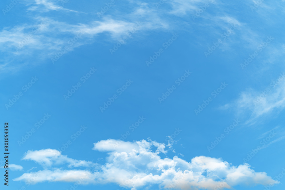 White cloud and blue sky background with copy space