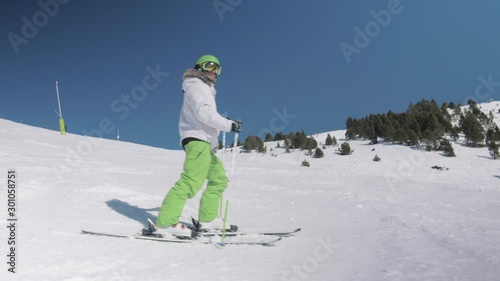 Modern Alpine Skier Posing on Fresh Snow in Sunny Weather Day 1
