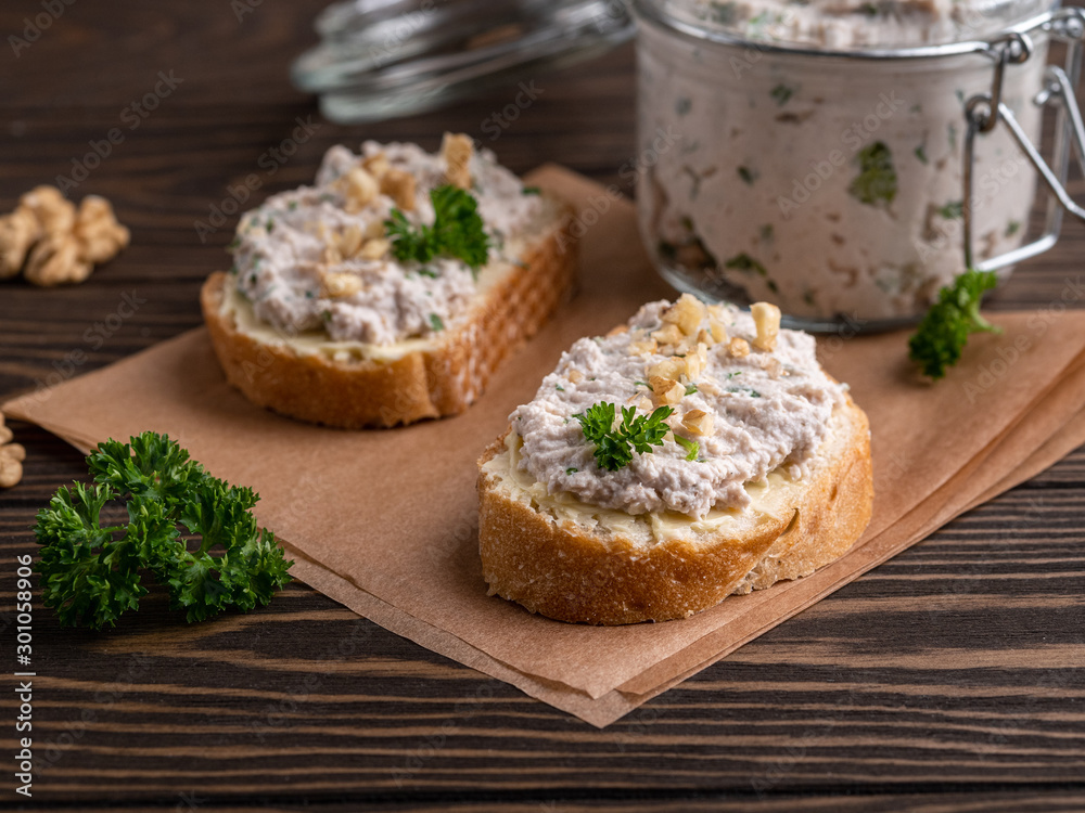 Tasty sandwiches with healthy chicken paste chopped walnuts and parsley Tasty sandwiches with healthy chicken paste chopped walnuts and parsley